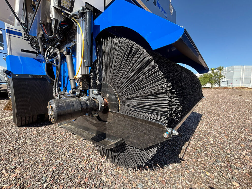 XBroom sweeper hopper and broom system in operation