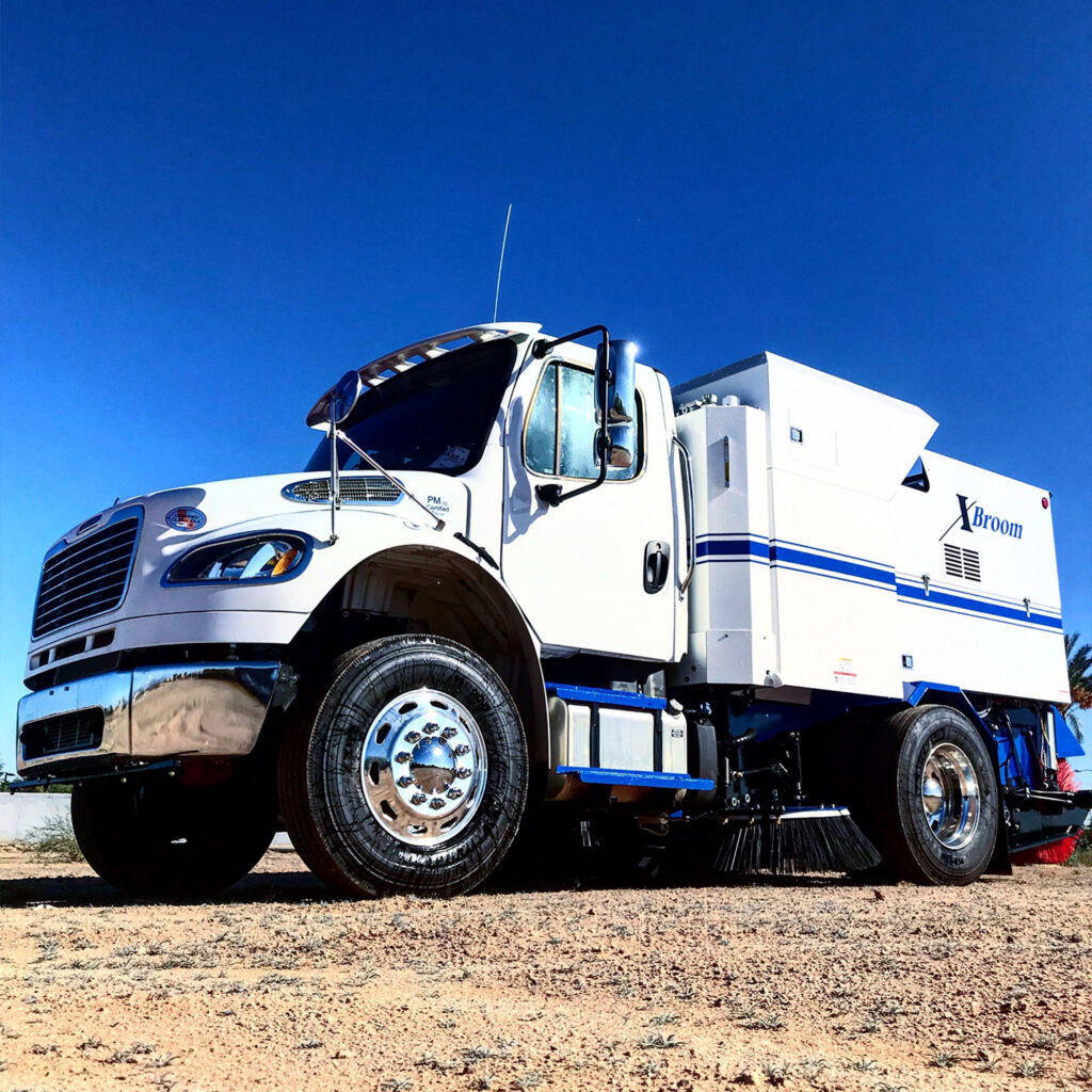 XBroom sweeper hopper and broom system in operation