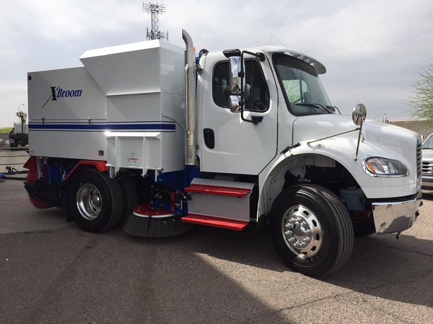 XBroom sweeper hopper and broom system in operation